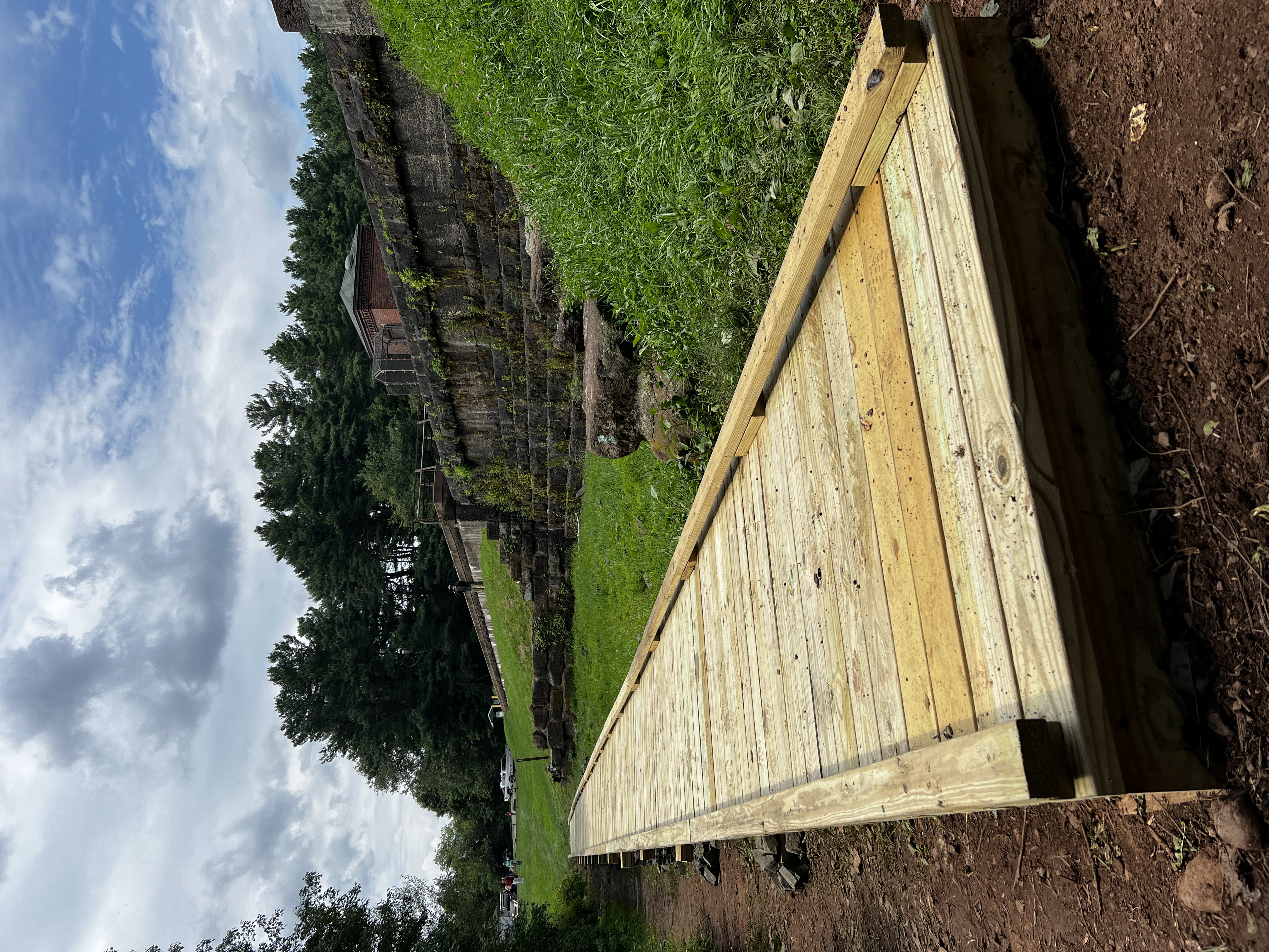 New elevated wooden boardwalk at Giuffrida Park in Meriden, Connecticut, supported by Suzio Quarry as a community park and trail improvement.